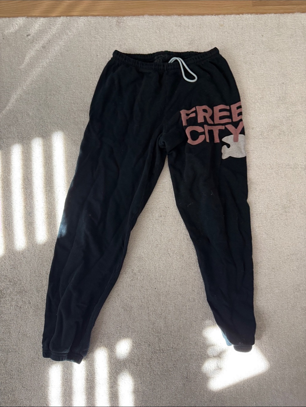 freecity Kids Black Sweatpants with Pink Logo and Cream Graphic